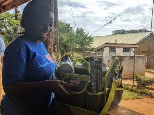 Lydia_with_toolkit_Uganda